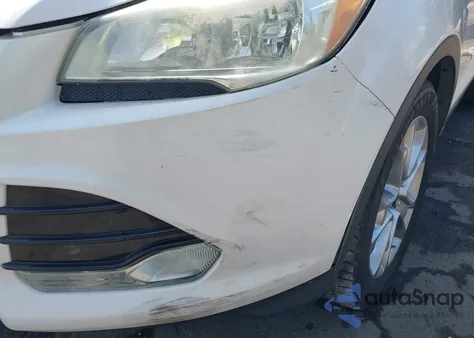 2016 Ford Escape Titanium z USA, uszkodzony, nr VIN 1FMCU0J99GUC66498